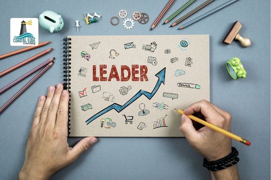 Leader writing on a notepad