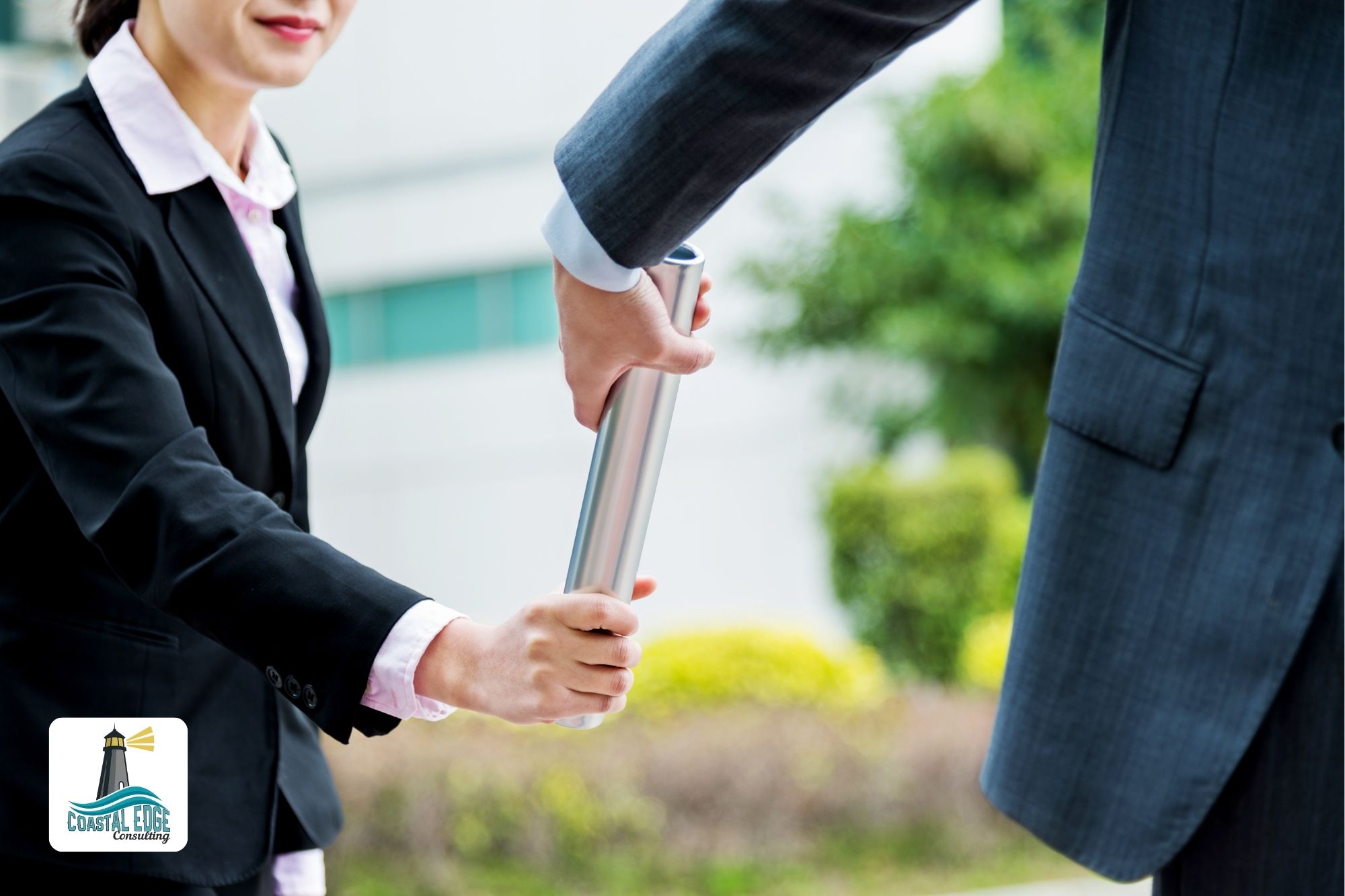 Business people passing a baton